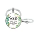 Close-up van inspirerende bijbel citaat glas cabochon sleutelhanger met zilveren metalen ring. - Stijl 14