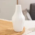 Weisse Plastik Origami Vase, modernes wellenformiges bruchsicheres Blumenvase fur Dekor. - Enghalsflaschen