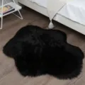 Black faux fur fluffy rug, soft irregular plush floor mat for living room and bedroom. - Black (Faux Wool)