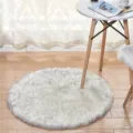 Round faux wool fluffy area rug, soft plush floor mat for bedroom, living room, and dressing table. - White with Black Tips