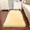 Fluffy faux fur area rug for bedroom bedside, soft shaggy floor mat in light yellow. - Beige