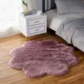Fluffy petal-shaped plush rug, soft faux wool bedroom floor mat for cozy home decor and comfort. - Grape Purple