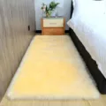Faux wool rug fluffy soft bedroom bedside floor mat cream yellow carpet non-slip pad - 20x40cm Rectangular / Beige