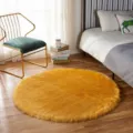 Soft fluffy round faux wool rug for bedroom bedside, comfortable plush floor mat living room. - Kumquat