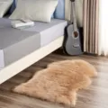 Fairy soft faux sheepskin fluffy area rug for bedroom floor, cozy non-slip irregular plush mat. - Light Coffee