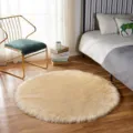 Fluffy round faux fur carpet for bedroom bedside, soft cream plush shaggy area rug for home. - Cozy Beige