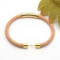 Braided leather bracelet with gold stainless steel clasp detail showing fine texture and design. - Style 9
