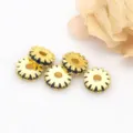 Close-up of gold gear spacer beads with blue rhinestone inlay for DIY bracelet making - Blue Zirconia