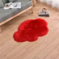 Fluffy faux wool area rug in vibrant red cloud shape, soft plush carpet for living room. - Bright Red Cloud