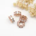 Close-up detail of rose gold rhinestone spacer beads, perfect for DIY jewelry making bracelets. - Rose Gold