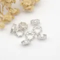 Close-up detail of silver micro-paved cubic zirconia spacer beads, perfect for DIY jewelry. - 8mm Hole About 4mm Thickness 2.9mm / Silver