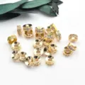 Gold plated micro pave zirconia spacer beads for DIY jewelry making, detailed shot of round charms. - 14K Gold