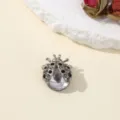 Exquisite silver-tone rhinestone ladybug brooch detail shot, delicate insect jewelry accessory. - Ladybug 1