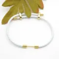 White braided leather bracelet with gold metal barbell clasp, stylish minimalist jewelry gift. - White