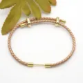 Braided leather bracelet with gold metal slider accessories, versatile couple jewelry item. - Mixed Colors