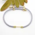 Light purple braided leather bracelet with gold metal hardware, stylish DIY accessory. - Light Purple