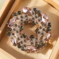 Vintage crystal brooch pin featuring pink marquise stones and floral wreath design for women. - 4.5x4.5cm / Purple