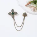 Vintage crystal rhinestone flower brooch detail, elegant double chain fashion accessory. - Four-Leaf Clover Green Gemstone Tassel Style (3) / Bronze