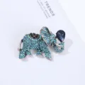 Close-up detail of rhinestone elephant brooch showing sparkling blue crystals and metallic texture. - 5.1*3.9*1.8cm / Lake Blue