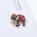 Detailed close-up of an exquisite alloy elephant brooch adorned with sparkling rhinestones. - 2.7*3.32cm / Red