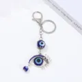 Portachiavi malocchio blu anello metallico portafortuna ciondolo auto accessorio elegante - Portachiavi Tutto Blu