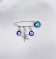 Detail van de boze oog broche met veiligheidsspeld, blauwe glazen kralen en een metalen zeester. - Zeester Stijl (4)