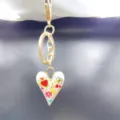 Gold alloy keychain with white enamel heart pendant and colorful doodle charms for bags. - Style H