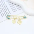 Exquisite gold safety pin brooch with blue rhinestones and Arabic calligraphy pendant. - Crown Blue Rhinestone Pin (A#H02) / 2.1x7.2cm