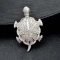 Close-up detail of silver crystal turtle brooch pendant featuring sparkling colorful rhinestones. - Money Turtle (YNCP6377) / Size 7.4x4.9x1.1cm / Silver (AB Rhinestone)