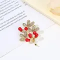 Elegant gold-tone rhinestone leaf and red berry brooch pin for women fashion clothing. - Red Fruit Branch Style / Red