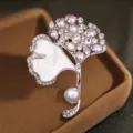 Exquisite ginkgo leaf brooch with sparkling pink crystals and elegant pearl detail. - 12.00g / 4.5*5.2CM / Silver