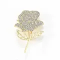 Rhinestone rose brooch detail view, elegant gold floral corsage pin for jacket clothing decor. - Gold