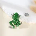 Detailed view of a charming green enamel frog magnetic brooch with rhinestones and magnetic clasp. - Frog Style / 4.5x3.7cm / 17 Size 4.5x3.7cm Weight 24.9g