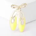 Elegant gold ballet pointe shoes brooch featuring yellow enamel bow design for women fashion. - 4x2.2x0.9cm (1 Piece) / Light Yellow