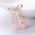 Elegant pink enamel ballet shoes brooch with bow, French style fashion jewellery for women main view - 4x2.2x0.9cm (1 Piece) / Light Pink