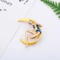 Detailed view of the elegant crescent moon girl brooch, crafted with gold alloy and blue enamel. - Moon Girl (7#)