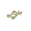 Strass Kristall Musiknote Brosche Nadel, goldfarbenes Metall, elegantes Mode Accessoire Detail. - Goldene Musiknote