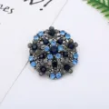 Detailed view of a vintage blue rhinestone floral brooch, featuring sparkling crystals. - Retro Blue Flower (17#)