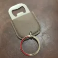 Stainless steel bottle opener keychain with PU leather wrap for beer and bar tools main view - Coffee