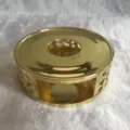 Gold stainless steel tea warmer detail view, hollow design for candle heating, elegant table accent. - EK2126G