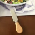 Stainless steel cheese knife with wooden handle for cutting cheese and butter smoothly. - Wooden Handle Square Knife