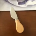 Stainless steel cheese knife with wooden handle for kitchen and dining tabletop use - Wooden Handle Pointed Knife