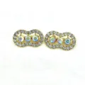 Rhinestone peanut brooch detail shot, alloy crystal lapel pin, elegant scarf buckle accessory. - Milky White