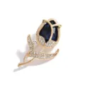 Close-up detail shot of the elegant tulip shaped brooch with dark blue crystal and rhinestones. - Dark Blue