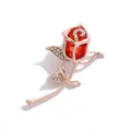 Close-up detail of exquisite rose flower brooch with red crystal and dazzling rhinestones in gold finish. - Red (2)