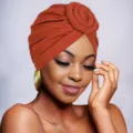 Stylish women brown turban hat solid color twisted knot head wrap fashion chemo hat - One Size / Rust red