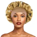 Wide brim satin sleep cap with butterfly print, elastic hair bonnet for night care and styling. - One Size / Gold