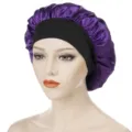 Purple satin sleep cap with wide black elastic band, soft hair care bonnet for women night. - One Size / Purple