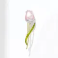 Detailed close-up view of the pink tulip brooch showcasing its delicate leaf and stem. - Champagne Pink