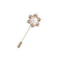Vintage gold-tone snowflake brooch detail with faux pearl and sparkling crystal accents. - Style 4 (Snowflake Long Pin Brooch)